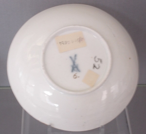 Copy of Meissen crossed swords on a saucer by Cookworthy - Reproduced by Permission of Plymouth City council Museums and Archives